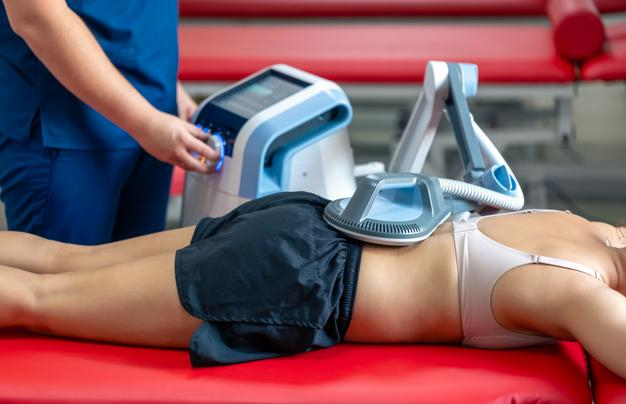 Woman receiving premium body contouring treatment at HMS Fat Freezing Dubai clinic