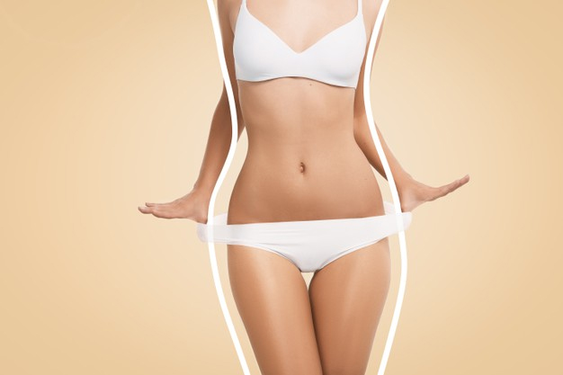 Patient receiving non-surgical belly fat removal treatment at HMS Fat Freezing Dubai