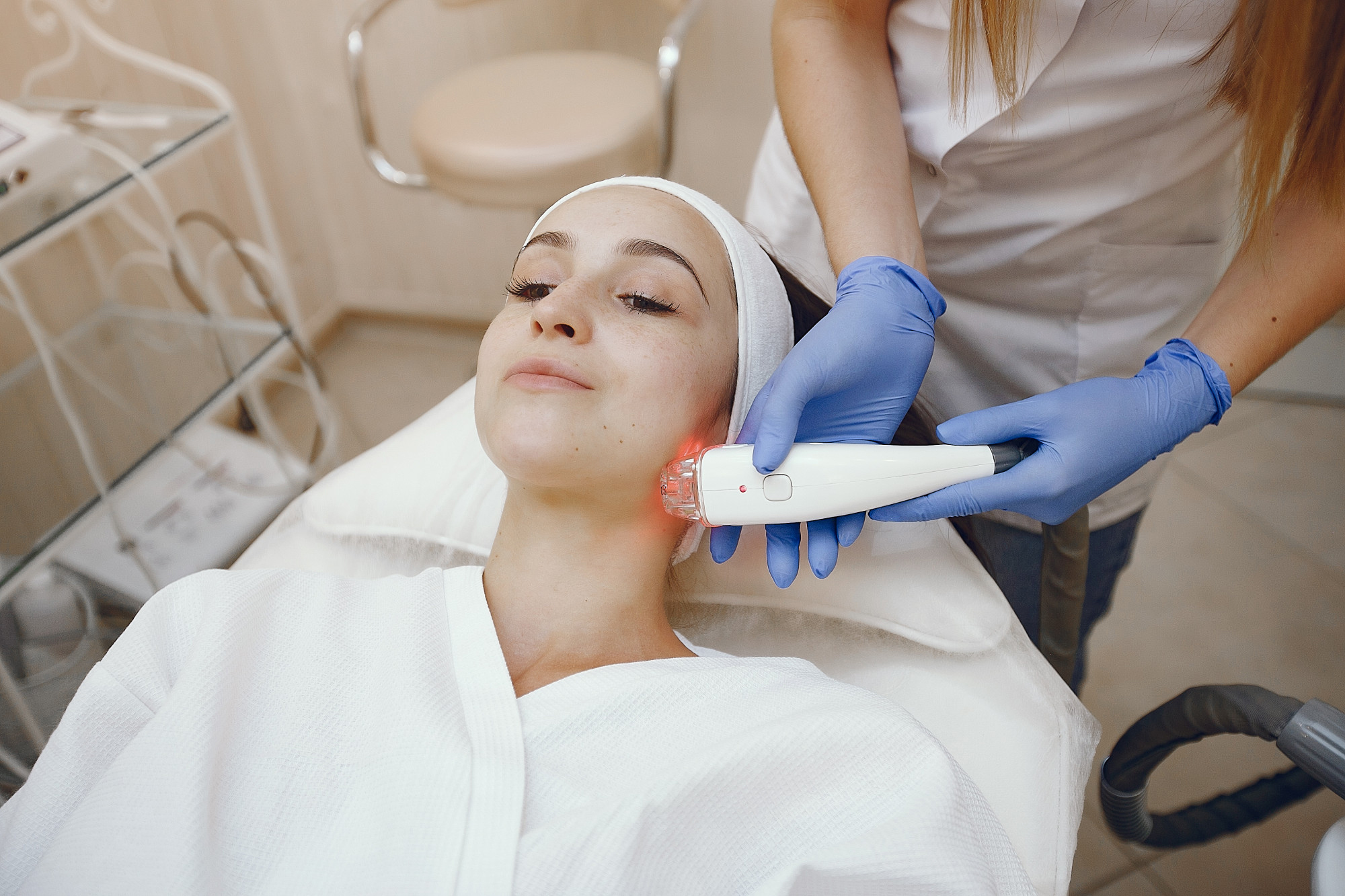 Woman receiving professional non-surgical skin tightening treatment at HMS Fat Freezing Dubai